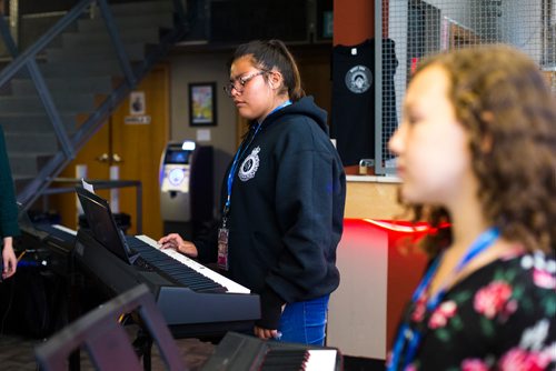 MIKAELA MACKENZIE / WINNIPEG FREE PRESS
Yeah Creeley plays during the keyboard class at the inaugural Girls Rock Winnipeg, a new day camp in which girls and non-binary youth form a band, write a song, record, and perform in the space of a week, at the West End Cultural Centre in Winnipeg on Wednesday, Aug. 15, 2018. 
Winnipeg Free Press 2018.