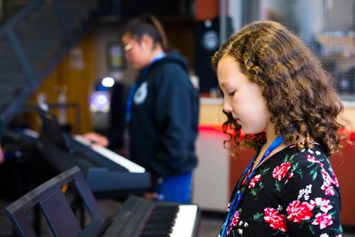 MIKAELA MACKENZIE / WINNIPEG FREE PRESS
Amellie Tara plays during the keyboard class at the inaugural Girls Rock Winnipeg, a new day camp in which girls and non-binary youth form a band, write a song, record, and perform in the space of a week, at the West End Cultural Centre in Winnipeg on Wednesday, Aug. 15, 2018. 
Winnipeg Free Press 2018.