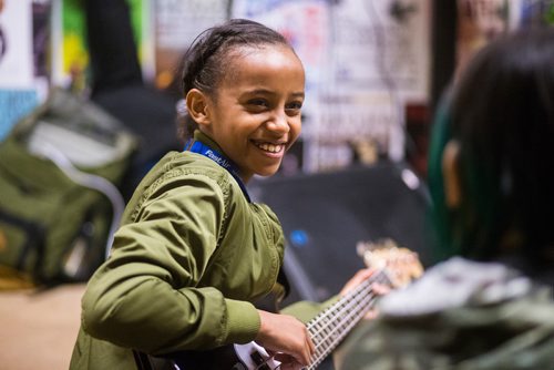 MIKAELA MACKENZIE / WINNIPEG FREE PRESS
Mallani Nabi plays during bass class at the inaugural Girls Rock Winnipeg, a new day camp in which girls and non-binary youth form a band, write a song, record, and perform in the space of a week, at the West End Cultural Centre in Winnipeg on Wednesday, Aug. 15, 2018. 
Winnipeg Free Press 2018.