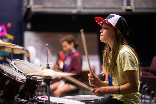 MIKAELA MACKENZIE / WINNIPEG FREE PRESS
Mollie Lysack rocks out during drum class at the inaugural Girls Rock Winnipeg, a new day camp in which girls and non-binary youth form a band, write a song, record, and perform in the space of a week, at the West End Cultural Centre in Winnipeg on Wednesday, Aug. 15, 2018. 
Winnipeg Free Press 2018.