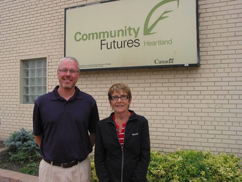 Canstar Community News Aug. 13, 2018 - Community Futures Heartland executive director Ken Friesen and community economic development coordinator Penny Schoonbaert are shown outside the Portage la Prairie office that has offered help to local entrepreneurs for 25 years. (ANDREA GEARY/CANSTAR COMMUNITY NEWS)