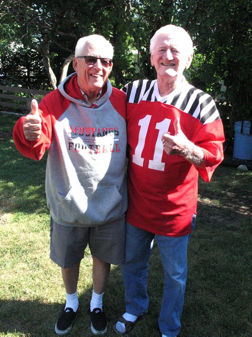 Canstar Community News Aug. 22, 2018 - Ron Leibl (left) and Don Butt are pictured in the run-up to the 70th anniversary of the St. Vital Mustangs Football Club. As part of the celebrations, a Homecoming Weekend Hall of Fame gala dinner will be held on Aug. 23 at the Mustangs' Clubhouse at 100 Frobisher Rd. Leibl and Butt both played for the southeast Winnipeg-based club. (PHOTO BY SIMON FULLER/CANSTAR NEWS/THE LANCE)