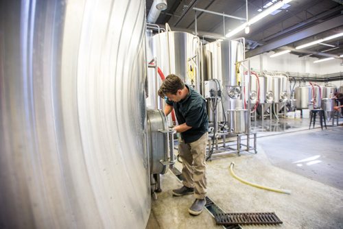 MIKAELA MACKENZIE / WINNIPEG FREE PRESS
Head brewer Mark Borowski, prepares a mash tun for brew at the new Nonsuch Brewing Co location in Winnipeg on Monday, Aug. 20, 2018.
Winnipeg Free Press 2018.