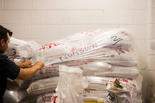 MIKAELA MACKENZIE / WINNIPEG FREE PRESS
Head brewer Mark Borowski, works in the grain room at the new Nonsuch Brewing Co location in Winnipeg on Monday, Aug. 20, 2018.
Winnipeg Free Press 2018.