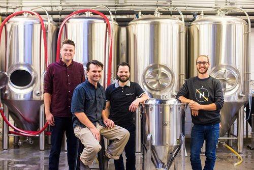 MIKAELA MACKENZIE / WINNIPEG FREE PRESS
Ben Myers (left), Mark Borowski, Matthew Sabourin, and Dylan Picton at the new Nonsuch Brewing Co location in Winnipeg on Monday, Aug. 20, 2018.
Winnipeg Free Press 2018.