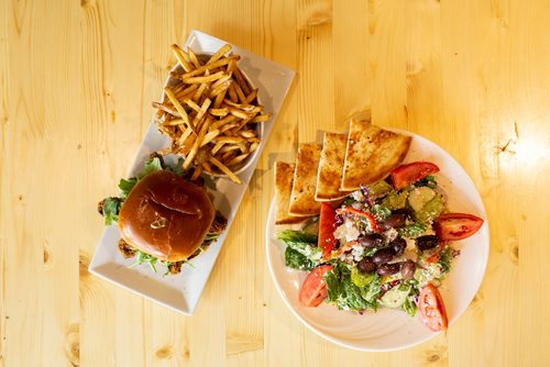 ANDREW RYAN / WINNIPEG FREE PRESS The portabollo mushroom burger, fries, and a greek salad at Pete's Place in Osbourne village on August 20, 2018.