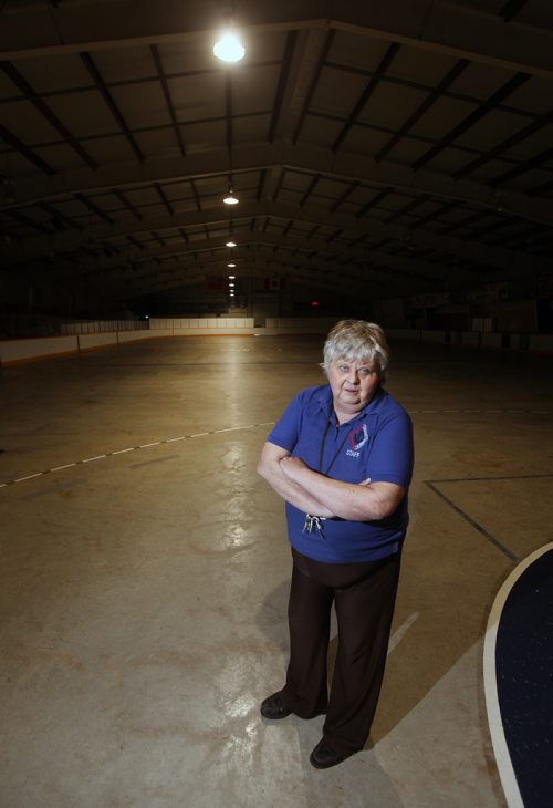 PHIL HOSSACK / WINNIPEG FREE PRESS -  Arena Manager Gisele Reynolds poses on the concrete surface at The St Boniface Notre Dame Community Centre. The  Ice Rink sits idle when normally they'd have begun making ice for the upcoming hockey season. Aldo Santin story.  - August 212, 2018
