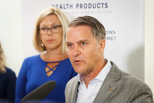 MIKE DEAL / WINNIPEG FREE PRESS
(from left) Rochelle Squires Minister of Sustainable Development and Cameron Friesen Minister of Health, Seniors and Active Living during an announcement at the Polo Park Shoppers Drug Mart that the provincial government has renewed a partnership to collect and safely dispose of unused or expired medication.
180822 - Wednesday, August 22, 2018.