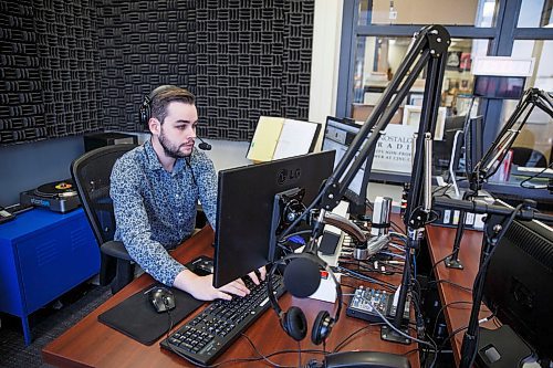 MIKE DEAL / WINNIPEG FREE PRESS
Adam Glynn, station manager at CJNU 93.7 FM, Winnipeg's non-profit nostalgia station, in the studio at Nostalgia Broadcasting Cooperative Inc. located in the Richardson Building. 
180822 - Wednesday, August 22, 2018.