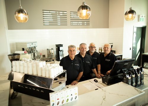 ANDREW RYAN / WINNIPEG FREE PRESS The Original Four DeLuca brothers, Peter, Tony, Frank and Pasquale pose for a portrait in their newest location on August 22, 2018.