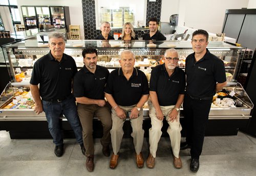 ANDREW RYAN / WINNIPEG FREE PRESS The DeLuca family poses for a portrait at their deli counter in their newest location on August 22, 2018. From back left is Tony, Carla, Marco. In the front row is Peter, Pablo, Pasquale Frank, and Fabio.