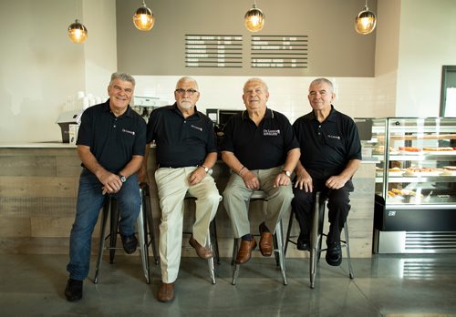 ANDREW RYAN / WINNIPEG FREE PRESS The Original Four DeLuca brothers, Peter, Frank, Pasquale and Frank pose for a portrait in their newest location on August 22, 2018.