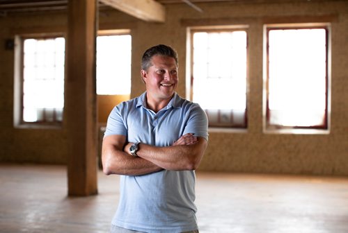 ANDREW RYAN / WINNIPEG FREE PRESS Local entrepreneur Jason Abbott poses for a portrait in the second of his spaces where remote workers can come and use the space for business meetings and work on August 23, 2018. The newest location is located in the Exchange District along Arthur Street.