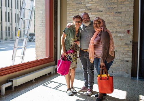 ANDREW RYAN / WINNIPEG FREE PRESS Three unlikely friends were made during the Living English for employment program design to teach practical language skills at Red River College's downtown campus on August 23, 2018. From left is Israeli Lemor Pliner, Canadian Forces Veteran Chuck Allen, and Eritrean refugee Mehret Abraha.