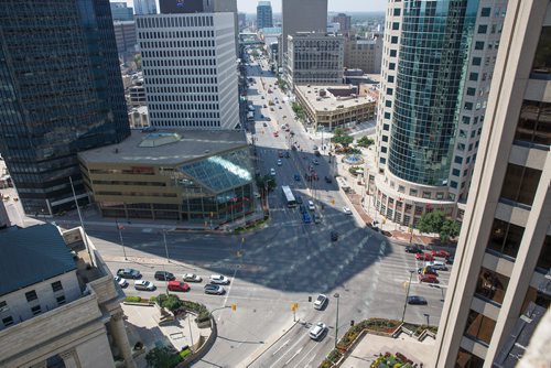 MIKE DEAL / WINNIPEG FREE PRESS
The intersection of Portage Avenue and Main Street as seen from the room of the Fairmont Hotel.
180823 - Thursday, August 23, 2018.