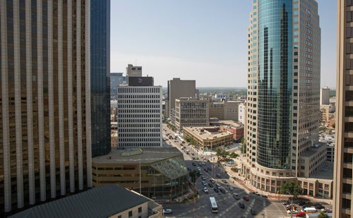 MIKE DEAL / WINNIPEG FREE PRESS
The intersection of Portage Avenue and Main Street as seen from the room of the Fairmont Hotel.
180823 - Thursday, August 23, 2018.