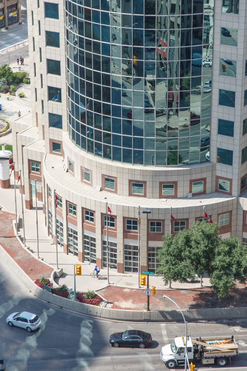 MIKE DEAL / WINNIPEG FREE PRESS
The intersection of Portage Avenue and Main Street as seen from the room of the Fairmont Hotel.
180823 - Thursday, August 23, 2018.