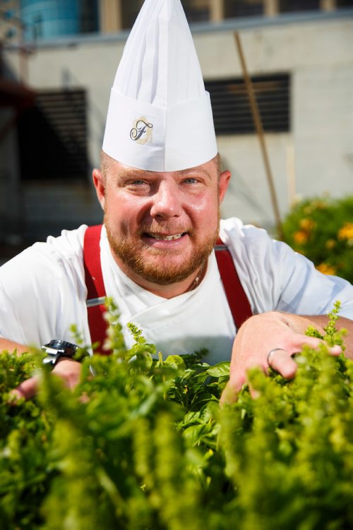 MIKE DEAL / WINNIPEG FREE PRESS
Tim Palmer, Executive Chef at the Fairmont Winnipeg at the rooftop herb garden.
180823 - Thursday, August 23, 2018.