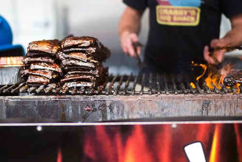 MIKAELA MACKENZIE / WINNIPEG FREE PRESS
Ribs on the grill at Crabby's BBQ Shack at Ribfest at the Forks in Winnipeg on Friday, Aug. 24, 2018.
Winnipeg Free Press 2018.