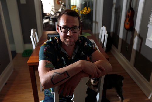 PHIL HOSSACK / WINNIPEG FREE PRESS -  SOBER LIFESTYLE, Rusty Matyas poses in his Crescentwood area home Friday. See Jen Zoratti story.  - August 24, 2018