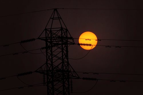 PHIL HOSSACK / WINNIPEG FREE PRESS -  A setting sun dissapears into the thickening smog west of Winnipeg Friday evening.  - August 24, 2018