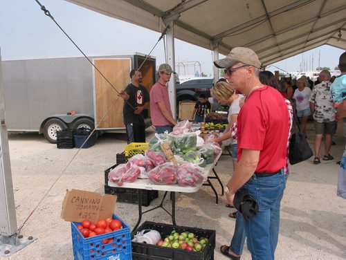 Canstar Community News Aug. 18, 2018 - Fresh vegetables, baking, honey, meat products, crafts and more were featured at the Red River Exhibition Park farmer's market on Aug. 18, (ANDREA GEARY/CANSTAR COMMUNITY NEWS)