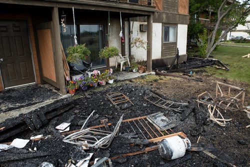 ANDREW RYAN / WINNIPEG FREE PRESS The remains of a fire which burned the roof clean off of an apartment complex in Southdale early Sunday morning. Shot on August 27, 2018.