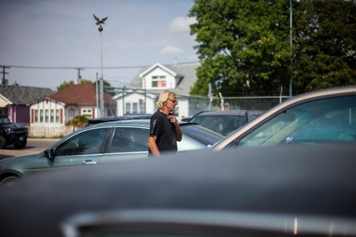 MIKAELA MACKENZIE / WINNIPEG FREE PRESS
Wes walks through the cars to help another employee at Harby's Auto & Body Shop in Winnipeg on Tuesday, Aug. 28, 2018. 
Winnipeg Free Press 2018.