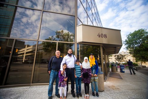 MIKAELA MACKENZIE / WINNIPEG FREE PRESS
Michael Kalo, (left), Tamiyah Mubeen, Azhar Mubeen, Buraq Mubeen, Hafsah Mubeen, and Khudija Mubeen pose in front of the courthouse in Winnipeg on Wednesday, Aug. 29, 2018. The Mubeen family is fighting a $27,000 water bill.
Winnipeg Free Press 2018.