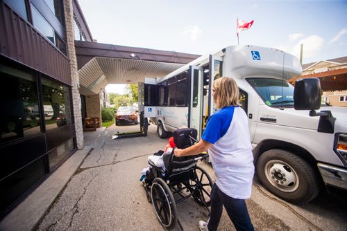 MIKAELA MACKENZIE / WINNIPEG FREE PRESS
Adrienne Lasson wheels Winnie Best back into the Lions Prairie Manor Personal Care Home after a short walk outside of the facility in Portage la Prairie on Wednesday, Aug. 29, 2018. Lasson says that she loves visiting with Winnie, but did note that it was a hassle that the top floor kitchen was closed, because residents now need to be brought down the elevator for their meals.
Winnipeg Free Press 2018.