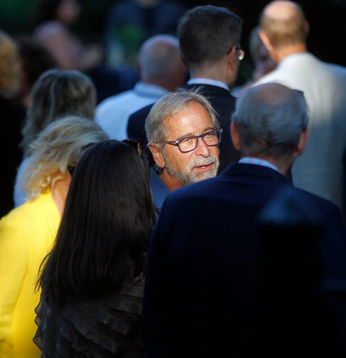 PHIL HOSSACK / WINNIPEG FREE PRESS - Bob Silver chats with Bob Cox at "Under the Stars" Wednesday evening in Assiniboine Park's Leo Mol Sculpture Garden prior to the funding announcement. See Eric Pindera' story. - August 25, 2018