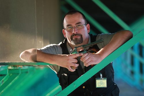 RUTH BONNEVILLE / WINNIPEG FREE PRESS


Brenden Roerich, President of the Winnipeg Revolver & Pistol Association, holds a Smith & Wesson Model 22 calibre gun in the target practice area Wednesday.

For story on banning handguns.  

See Dylan Robertson story. 
August 29/18
