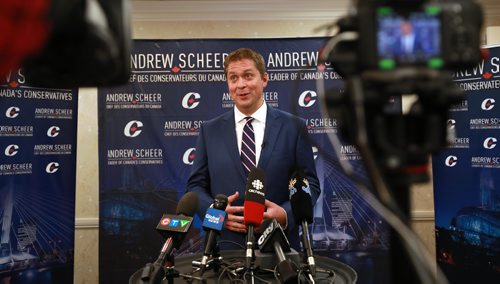 RUTH BONNEVILLE / WINNIPEG FREE PRESS


Leader of the Conservative Party of Canada, Andrew Scheer, talks with reporters at news conference at the Delta Hotel in Winnipeg Thursday.

See Larry's story. 

August 30/18
