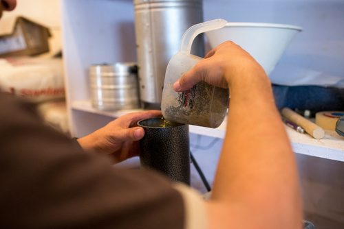 MIKAELA MACKENZIE / WINNIPEG FREE PRESS
Farmer Markus Isaac tests the hemp seeds for humidity percentage before harvesting near Kleefeld, Manitoba on Thursday, Aug. 30, 2018. 
Winnipeg Free Press 2018.