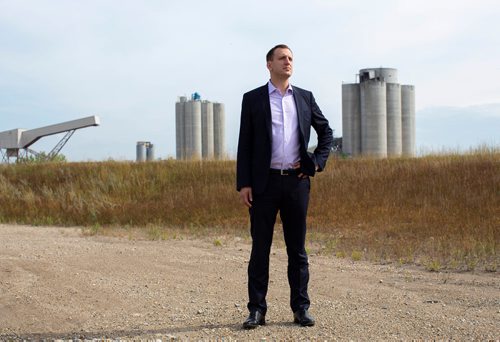ANDREW RYAN / WINNIPEG FREE PRESS Michael Golden, and his family have owned the 15 acre Inland Cement Plant for almost 20 years and is planning to develop the Winnipeg eye sore into a multi-million dollar commercial development. He poses for a portrait in front of the site on August 31, 2018.