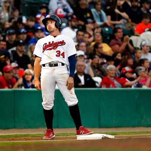 PHIL HOSSACK / WINNIPEG FREE PRESS -  Manitoba Goldeye #34 Tucker Nathans catches his breath after landing on third base Friday, he went on to score the first of two runs that inning against the Fargo Moorehead RedHawks. See story. - August 31, 2018