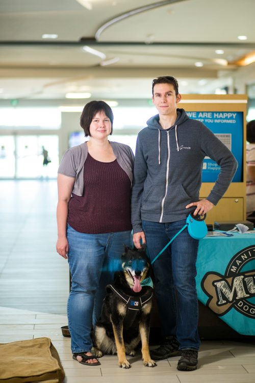 MIKAELA MACKENZIE / WINNIPEG FREE PRESS
Mindy Brown and Wes Hanney pose with Manitoba Mutts rescue dog Barbie at Kildonan Place in Winnipeg on Saturday, Sept. 1, 2018. 
Winnipeg Free Press 2018.