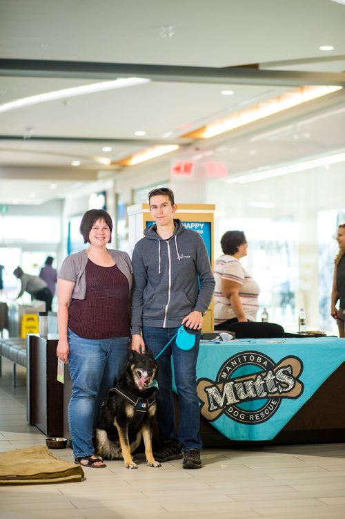 MIKAELA MACKENZIE / WINNIPEG FREE PRESS
Mindy Brown and Wes Hanney pose with Manitoba Mutts rescue dog Barbie at Kildonan Place in Winnipeg on Saturday, Sept. 1, 2018. 
Winnipeg Free Press 2018.