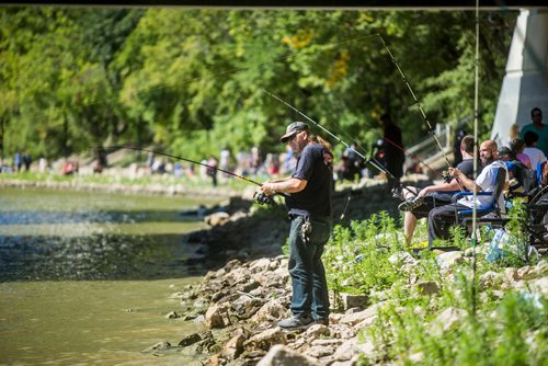 MIKAELA MACKENZIE / WINNIPEG FREE PRESS
Kelly Temchuk fishes at the annual Fall Fishing Derby at The Forks in Winnipeg on Saturday, Sept. 1, 2018.
Winnipeg Free Press 2018.