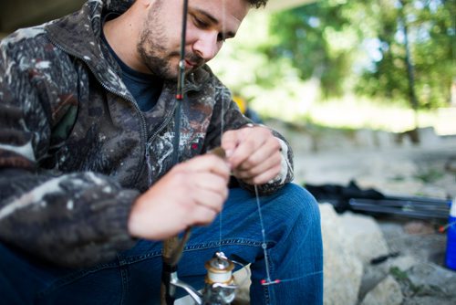 MIKAELA MACKENZIE / WINNIPEG FREE PRESS
Andrew Sullivan takes a small fish off the line at the annual Fall Fishing Derby at The Forks in Winnipeg on Saturday, Sept. 1, 2018.
Winnipeg Free Press 2018.