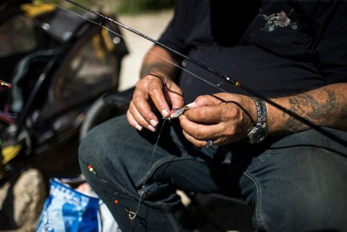 MIKAELA MACKENZIE / WINNIPEG FREE PRESS
Kelly Temchuk baits his line at the annual Fall Fishing Derby at The Forks in Winnipeg on Saturday, Sept. 1, 2018.
Winnipeg Free Press 2018.