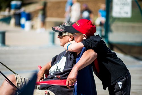 MIKAELA MACKENZIE / WINNIPEG FREE PRESS
Darlene Werstuik and her grandson, Tucker Ball (6), fish in the sun at the annual Fall Fishing Derby at The Forks in Winnipeg on Saturday, Sept. 1, 2018.
Winnipeg Free Press 2018.