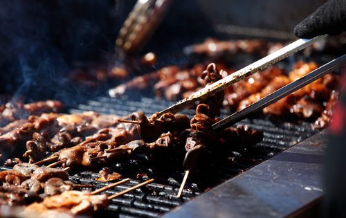 JOHN WOODS / WINNIPEG FREE PRESS
Some pork intestine delicacies are prepared by Hot Rod's Filipino Grill at the third annual Food Trip, the Filipino food festival, at Tyndall Park, Sunday, September 2, 2018.
