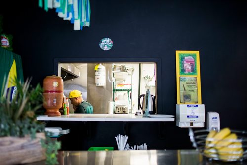 MIKAELA MACKENZIE / WINNIPEG FREE PRESS
Owner Sanderson Rabelo works in the kitchen at the Deli Brazil Cafe in Winnipeg on Tuesday, Sept. 4, 2018.
Winnipeg Free Press 2018.