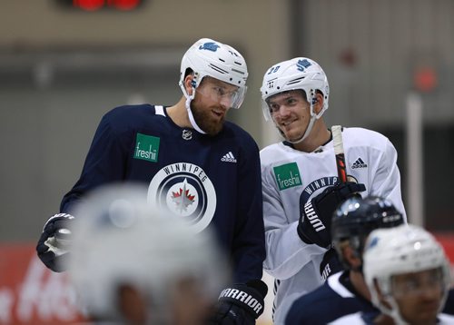 RUTH BONNEVILLE / WINNIPEG FREE PRESS 


Winnipeg Jets player, #26 Blake Wheeler smiles while talking to .Jack Roslovic  #28 during practice at Iceplex Tuesday.  Story about Wheeler signing a five-year contract extension.

See Jay Bell story.

September 4/18 
