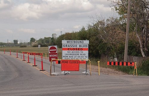 Canstar Community News Grassie Boulevard from Plessis Road to Skowron Crescent is closed to westbound traffic until October. (SHELDON BIRNIE/CANSTAR/THE HERALD)