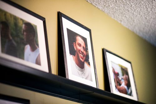 MIKAELA MACKENZIE / WINNIPEG FREE PRESS
A wall dedicated to pictures of Bruce in the Oake family home in Winnipeg on Tuesday, Sept. 4, 2018. The family is dedicated to opening the Bruce Oake Recovery Centre, a project sparked by the tragic death of their son Bruce seven years ago.
Winnipeg Free Press 2018.