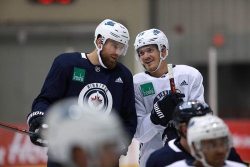 RUTH BONNEVILLE / WINNIPEG FREE PRESS 


Winnipeg Jets player, #26 Blake Wheeler, smiles while talking to, Jack Roslovic  #28, during practice at Iceplex Tuesday.  Story about Wheeler signing a five-year contract extension.

See Jay Bell story.

September 4/18 
