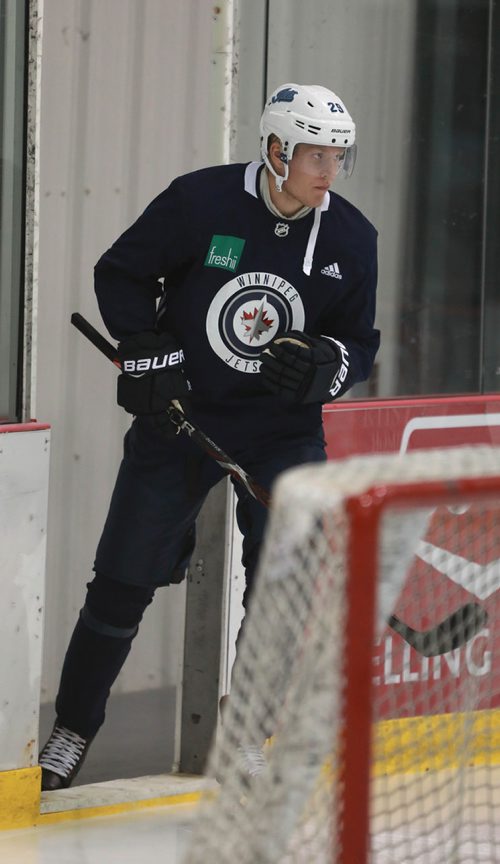 RUTH BONNEVILLE / WINNIPEG FREE PRESS 


WPG Jets #29, Patrick Laine, steps  onto the ice to practice with teammates at Icelplex Wednesday morning.

See Laine Story.  


September 5/18 

