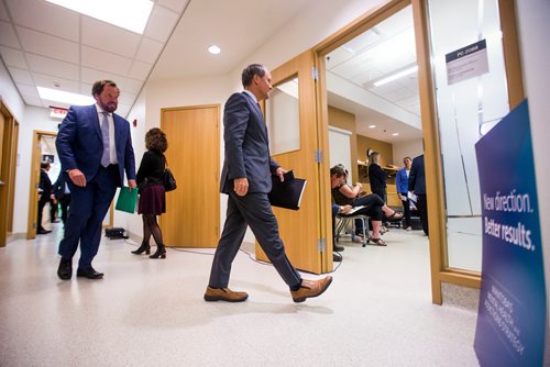 MIKAELA MACKENZIE / WINNIPEG FREE PRESS
Health, Seniors and Active Living Minister Cameron Friesen (right) and VP and Chief Medical Officer of the WRHA Bruce Roe walk in before announcing the opening of a Rapid Access to Addictions Medicine clinic in Winnipeg on Wednesday, Sept. 5, 2018. 
Winnipeg Free Press 2018.